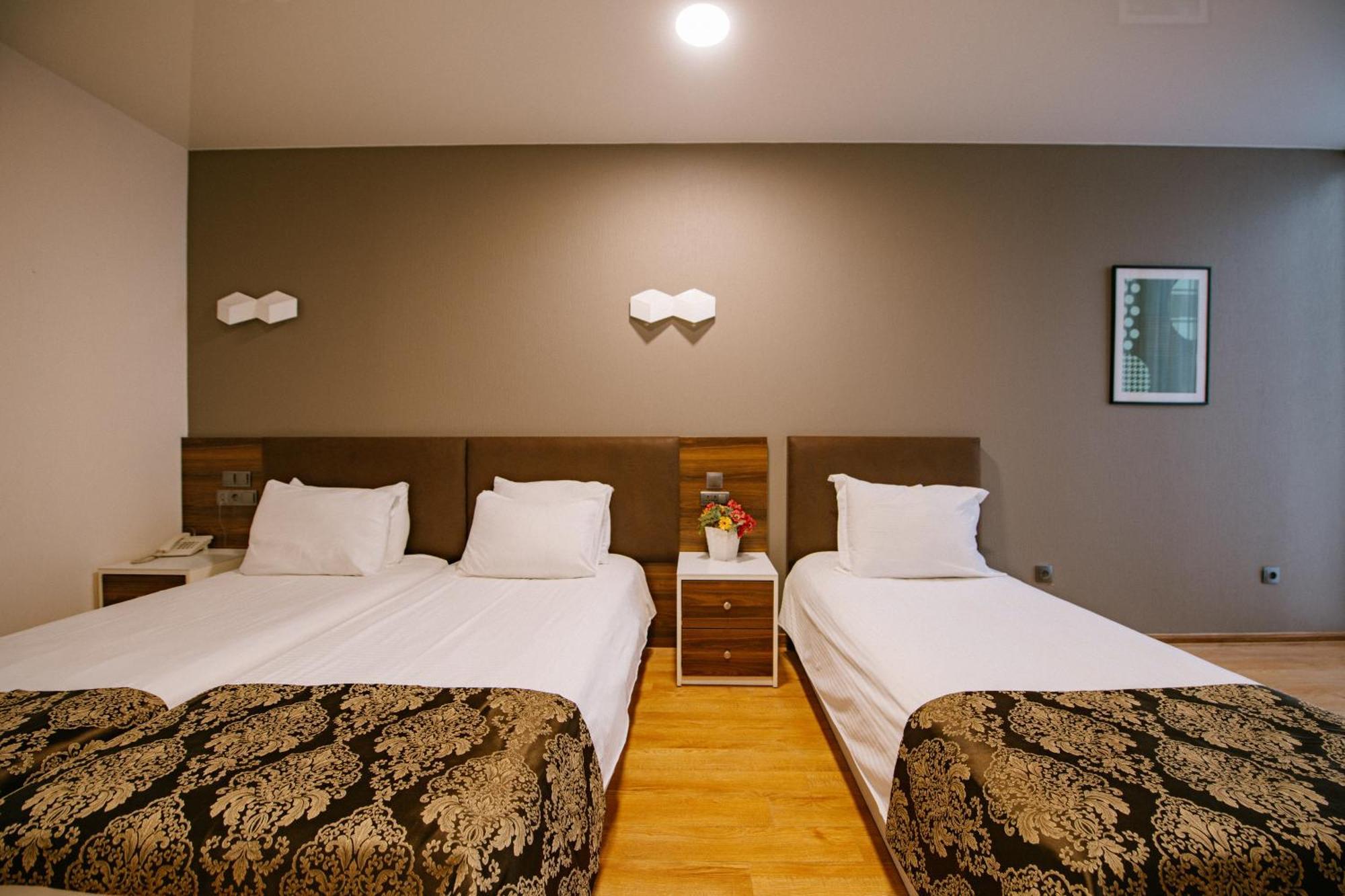 Iveria Inn Hotel Tbilisi Quarto foto